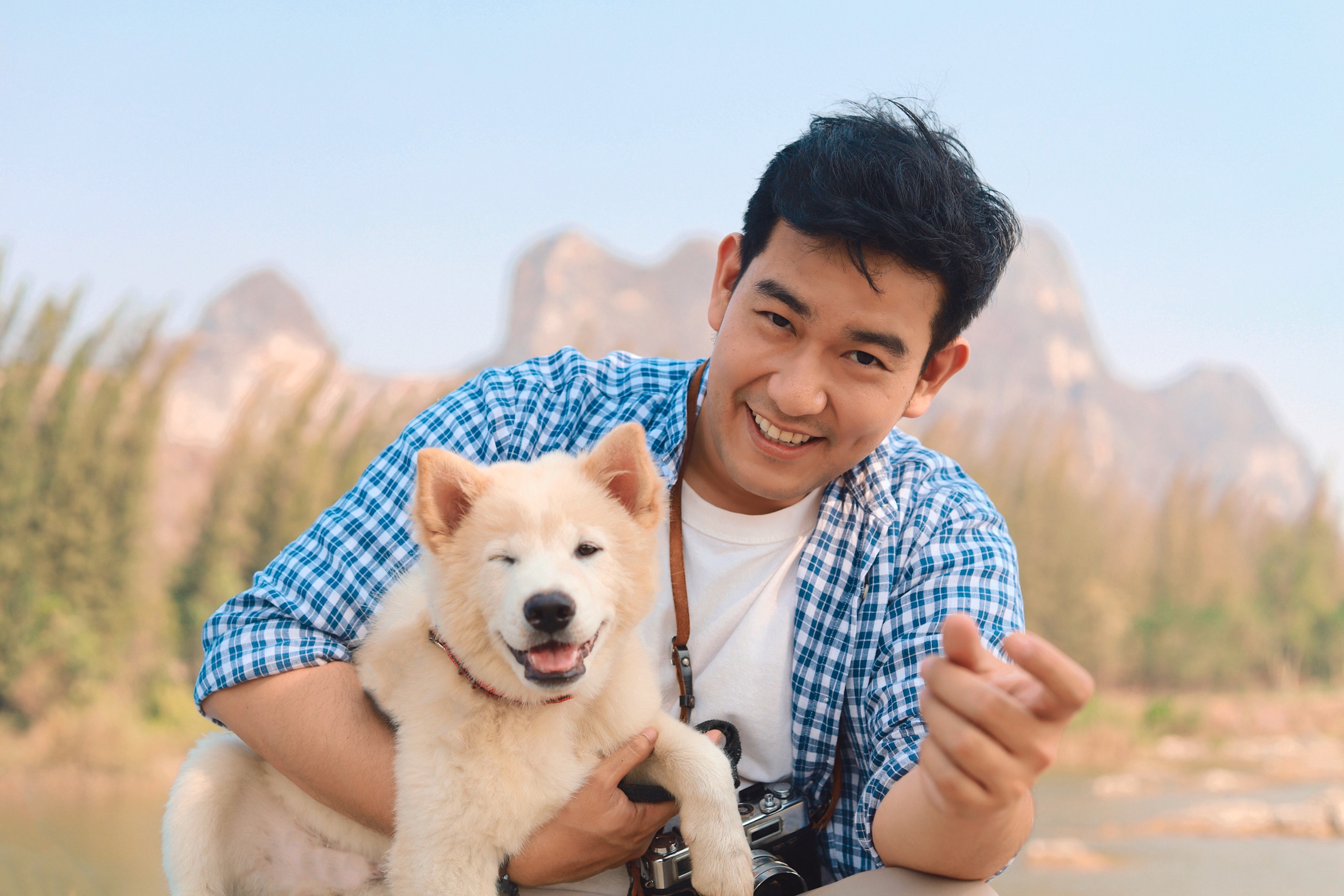 Asian man with pet