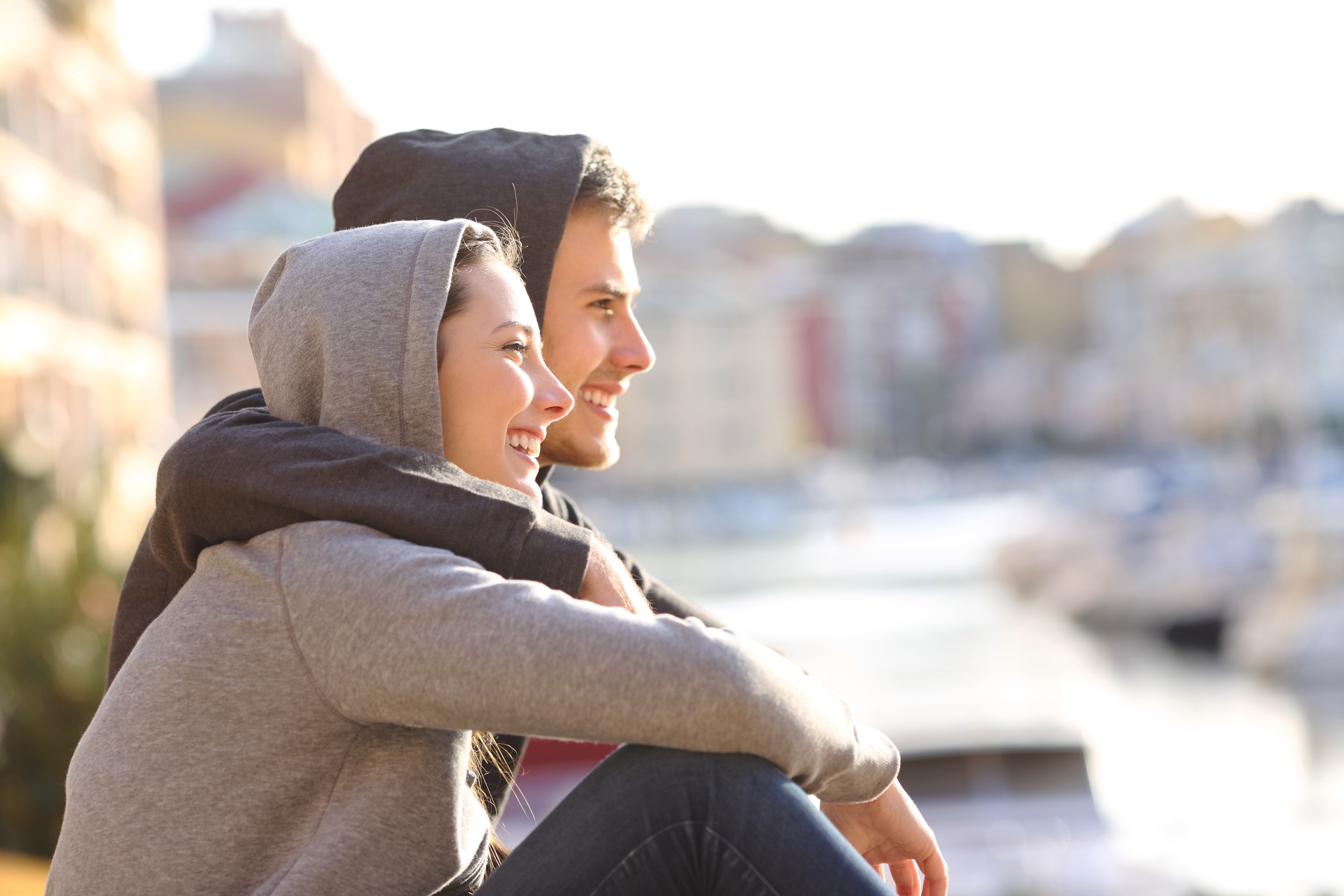 Happy couple looking out