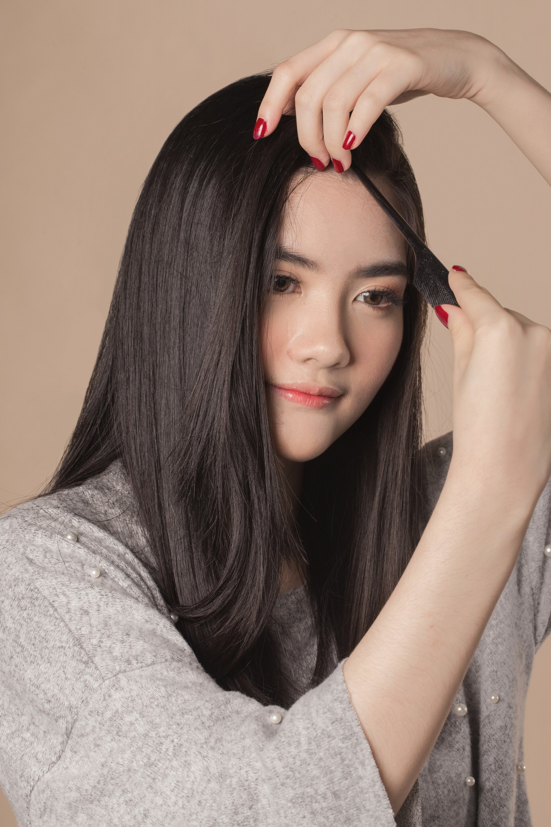 Membelah rambut menjadi dua