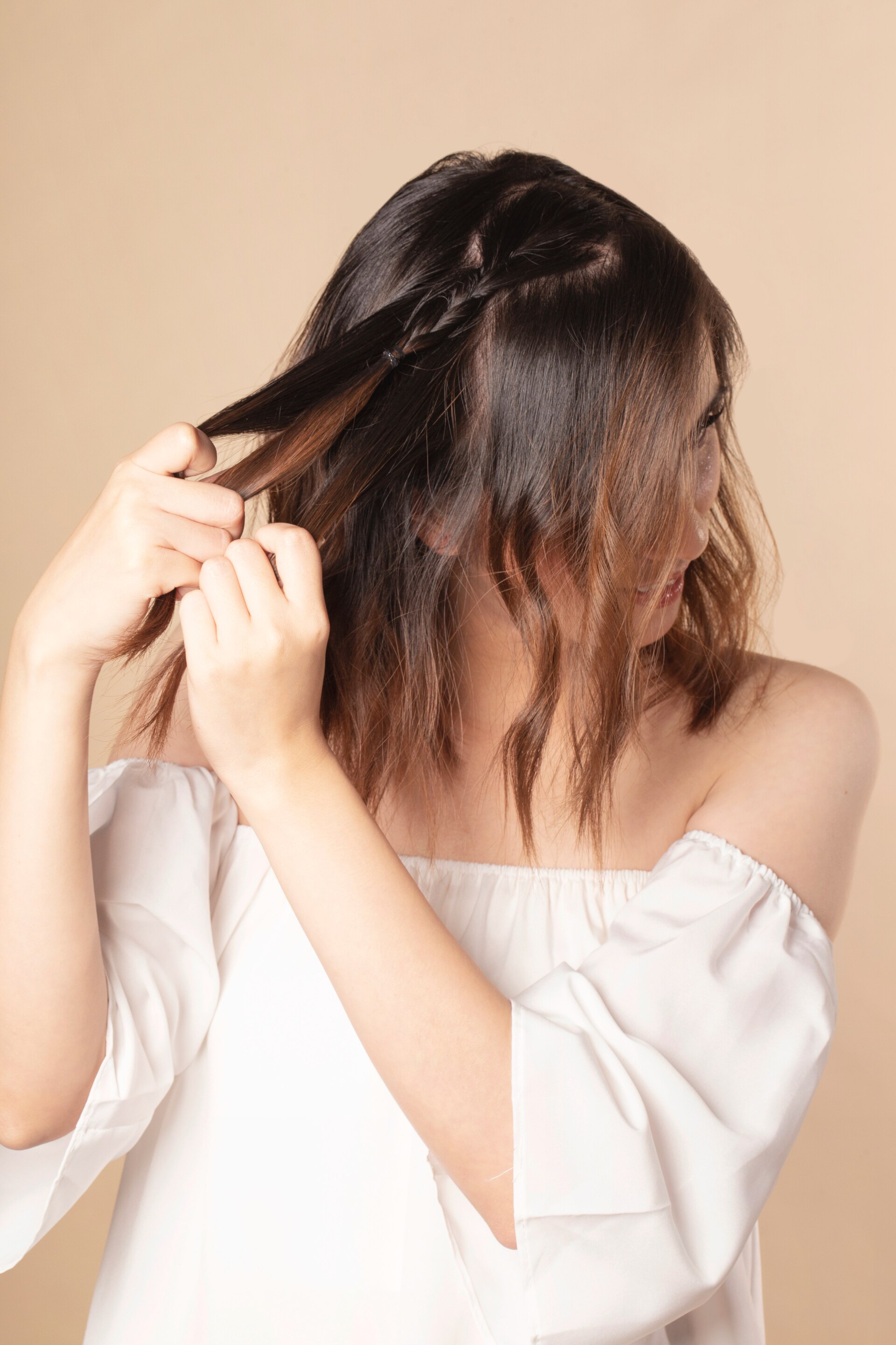 Woman with dark brown balayage straight hair