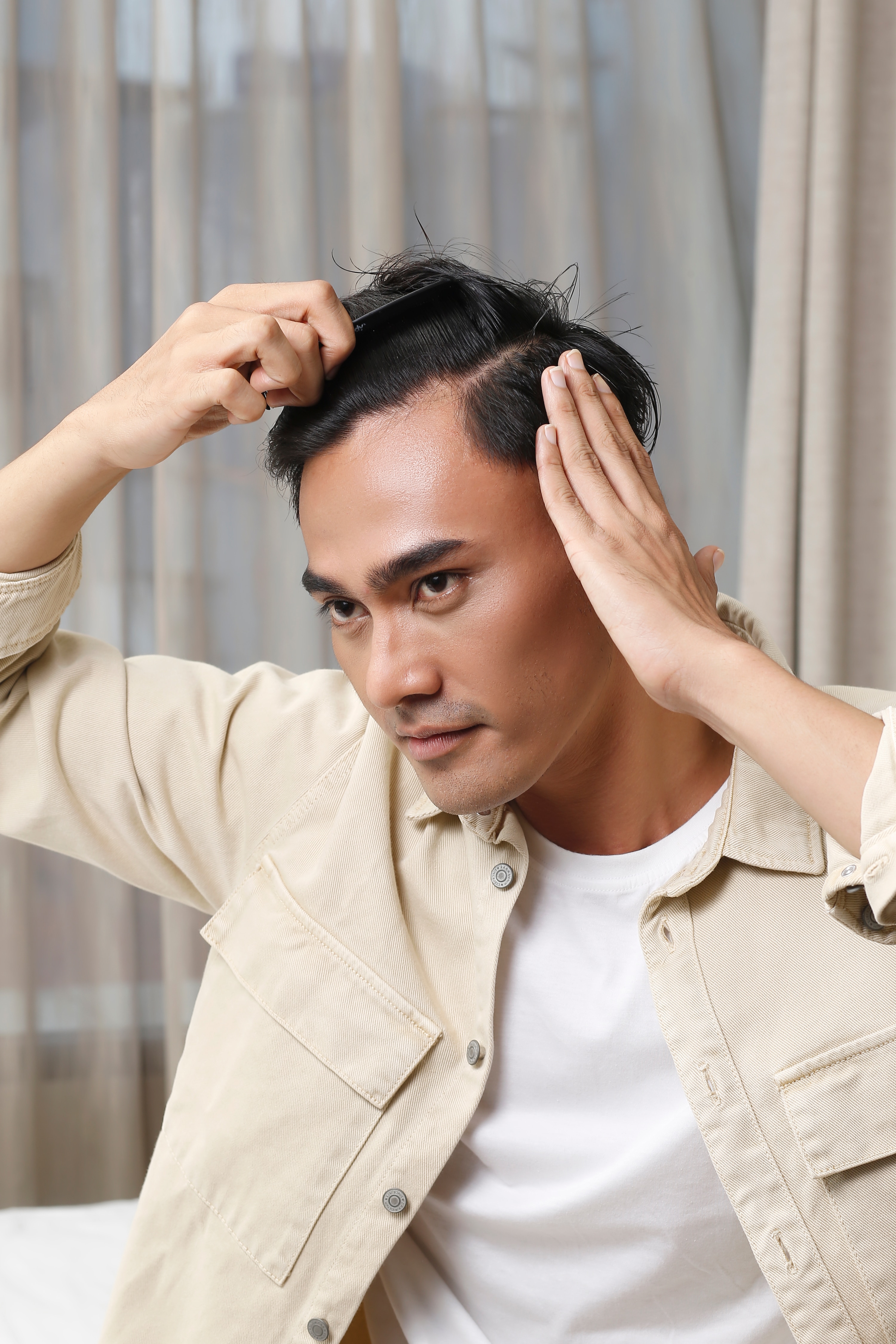 model rambut bergelombang pria