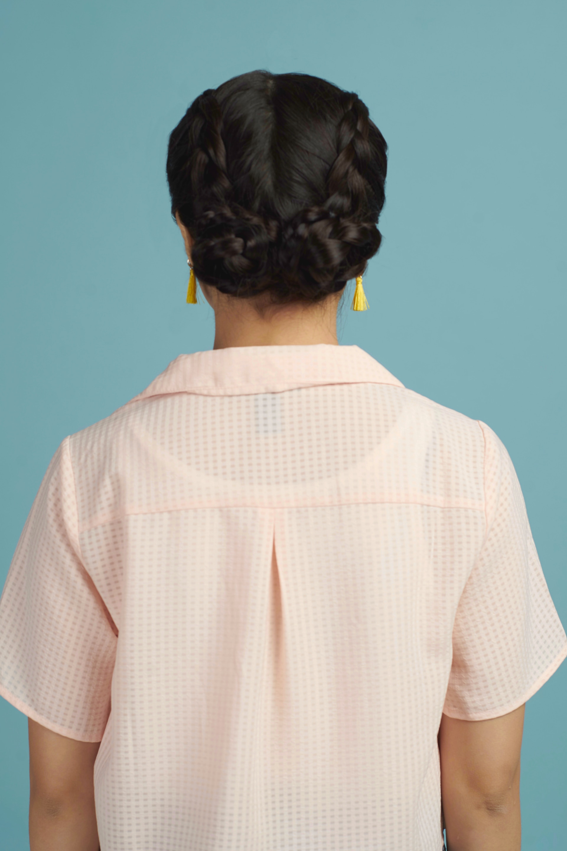 Tampilan akhir double Dutch braid bun. (Foto: Hariono Halim)