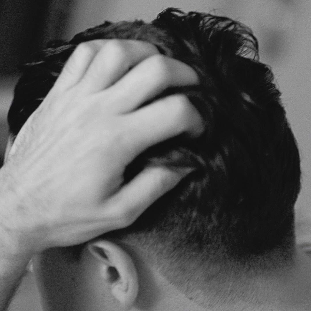 A man washing his hair