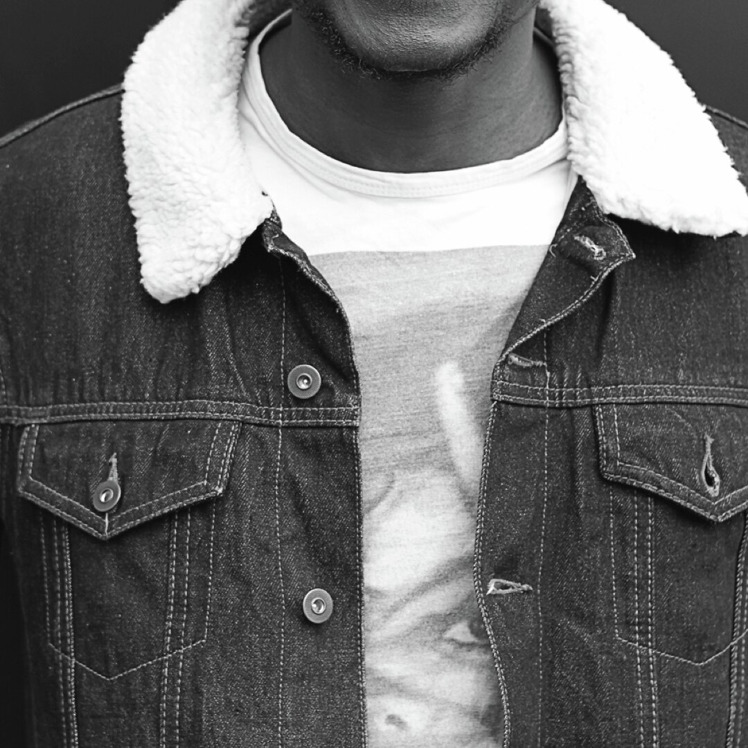 A guy in a denim jacket with a shearling lining.