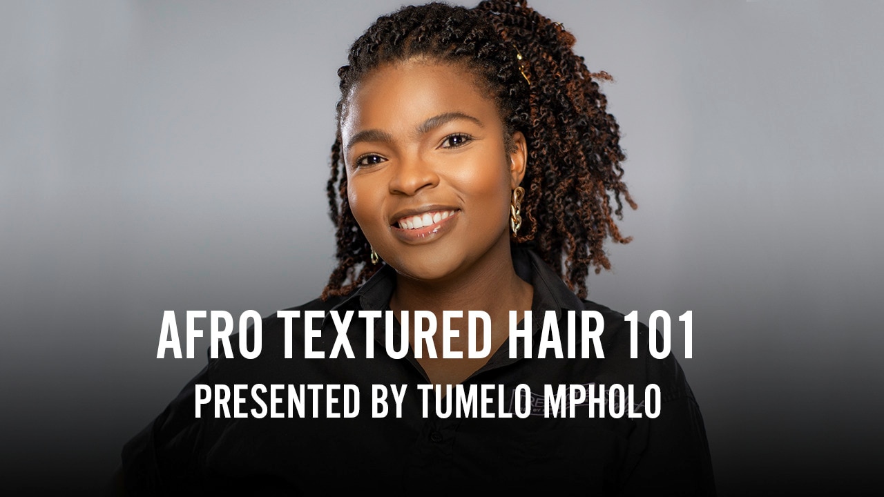 Female Hair Stylist discussing how to manage Afro Textured Hair