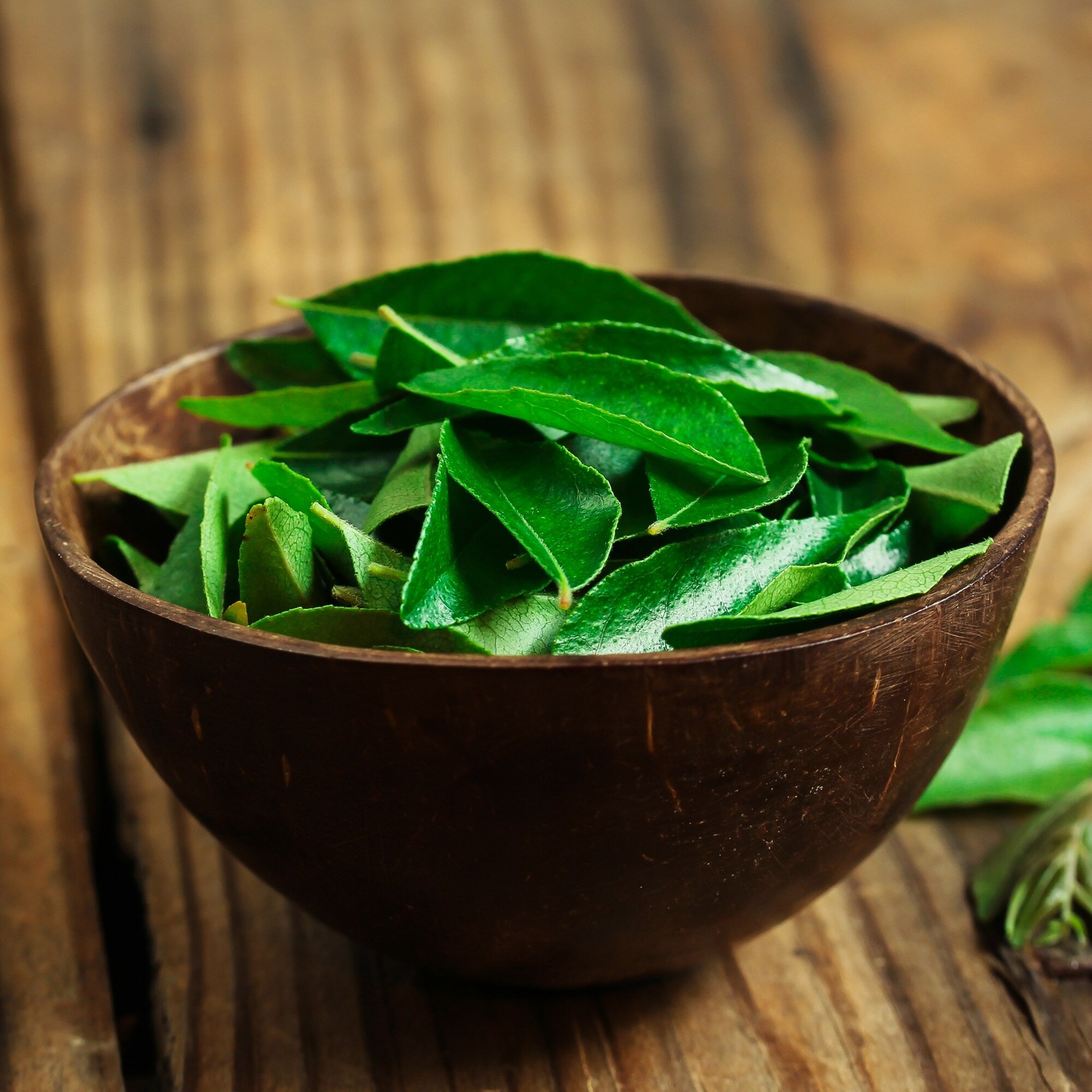 A bowl of curry leaves