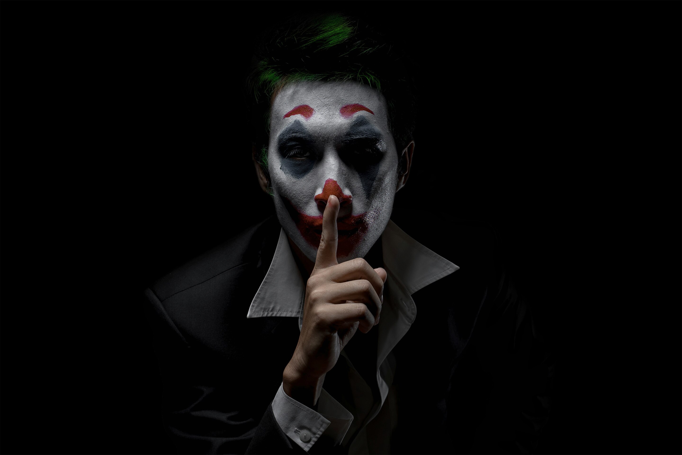 Joaquin Phoenix as the Joker with green hair