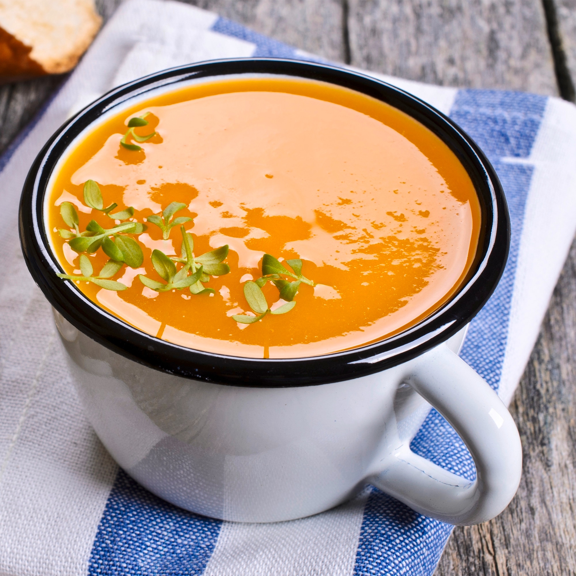 Butternut soup in a metal cup