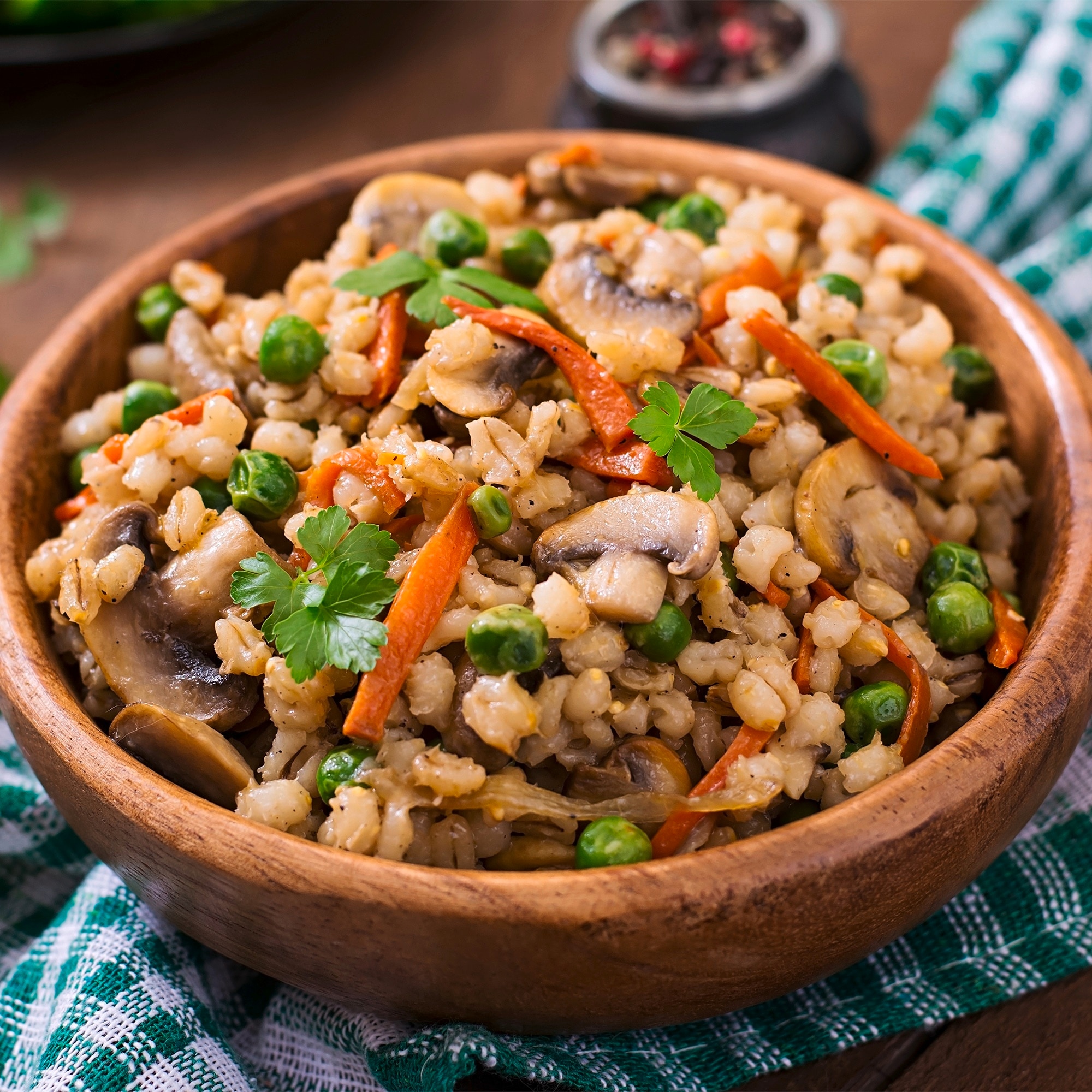 Bowl of barley with vegetables