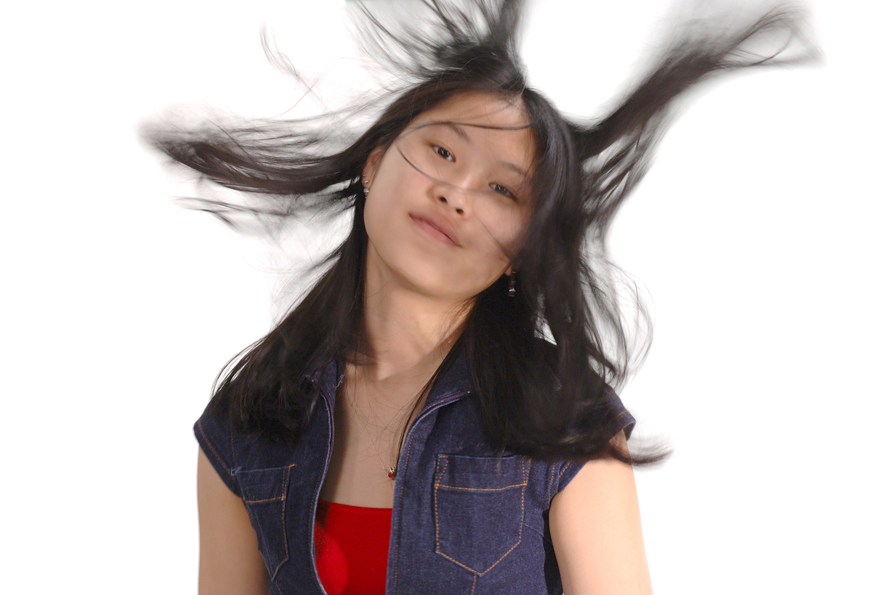 A woman with hair flying everywhere
