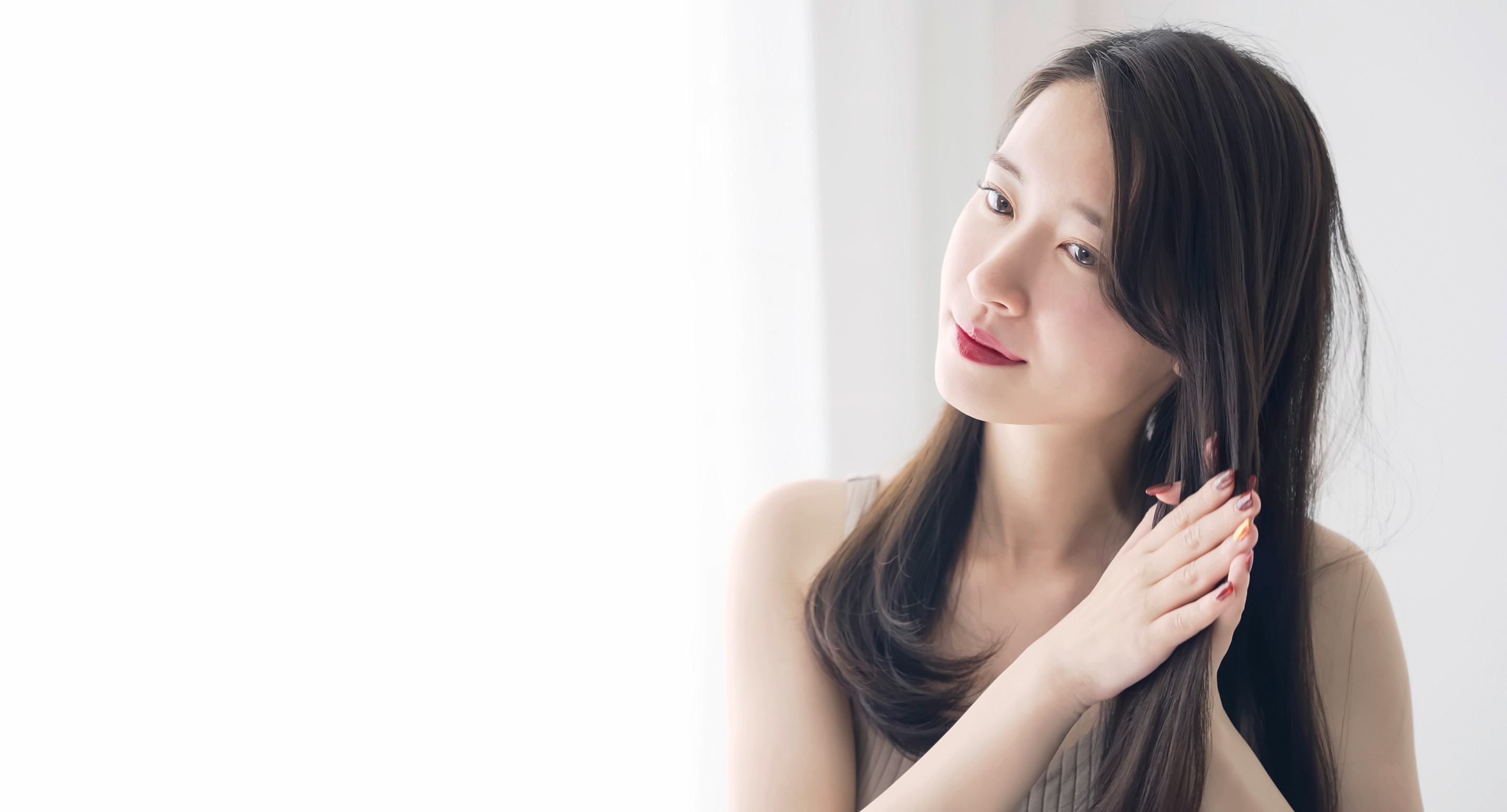 Asian women holding hair