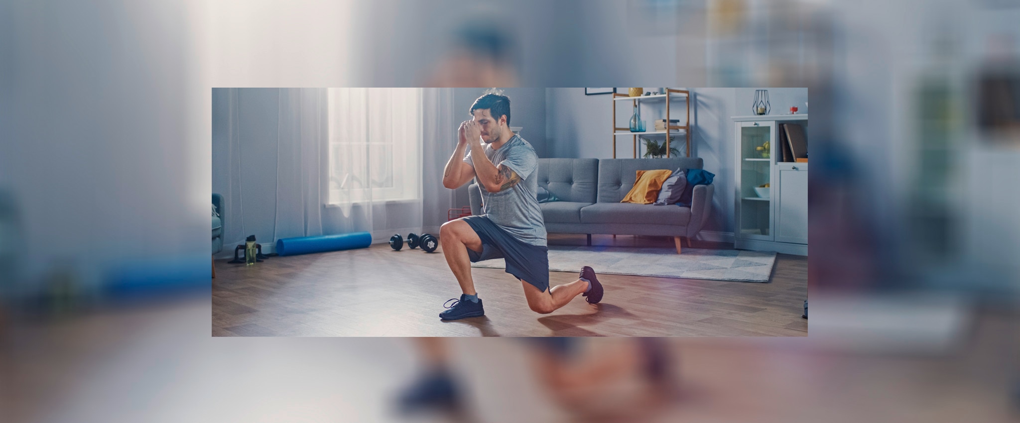 A man doing lunges in his lounge area