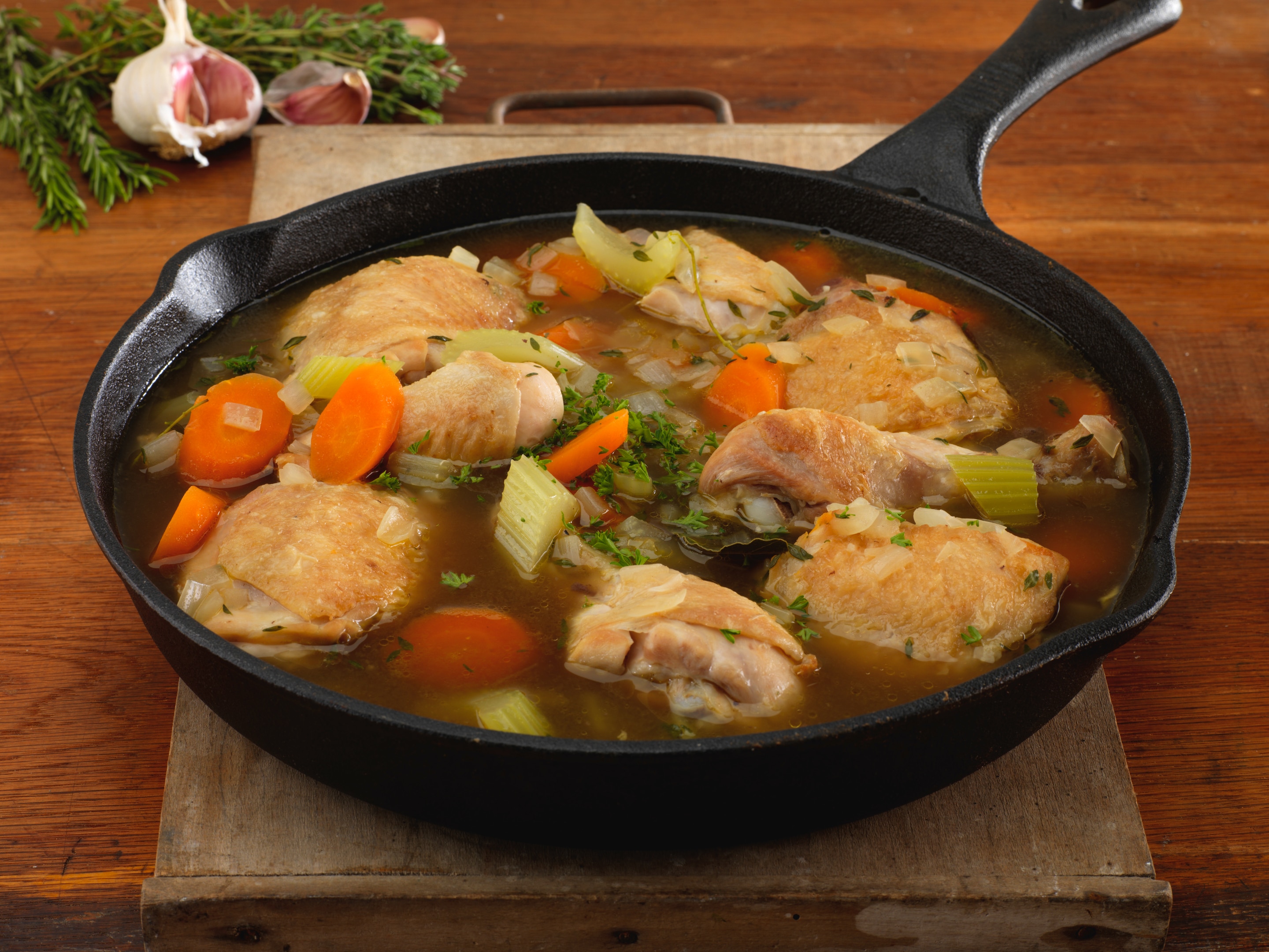 Chicken stew with chicken thighs, carrots, knorr stock, onions and herbs
