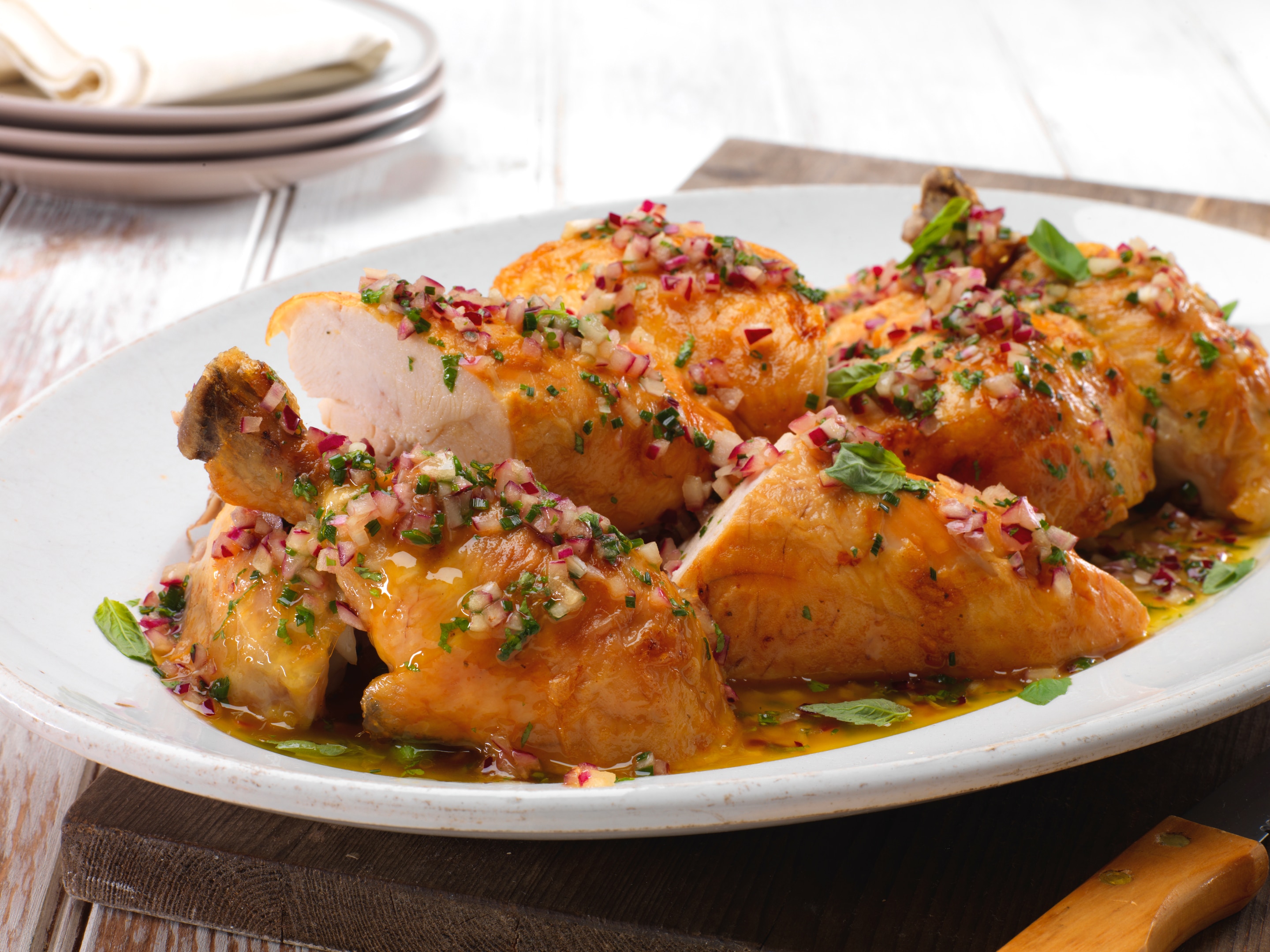 Roast chicken with vinaigrette of herbs and red onions
