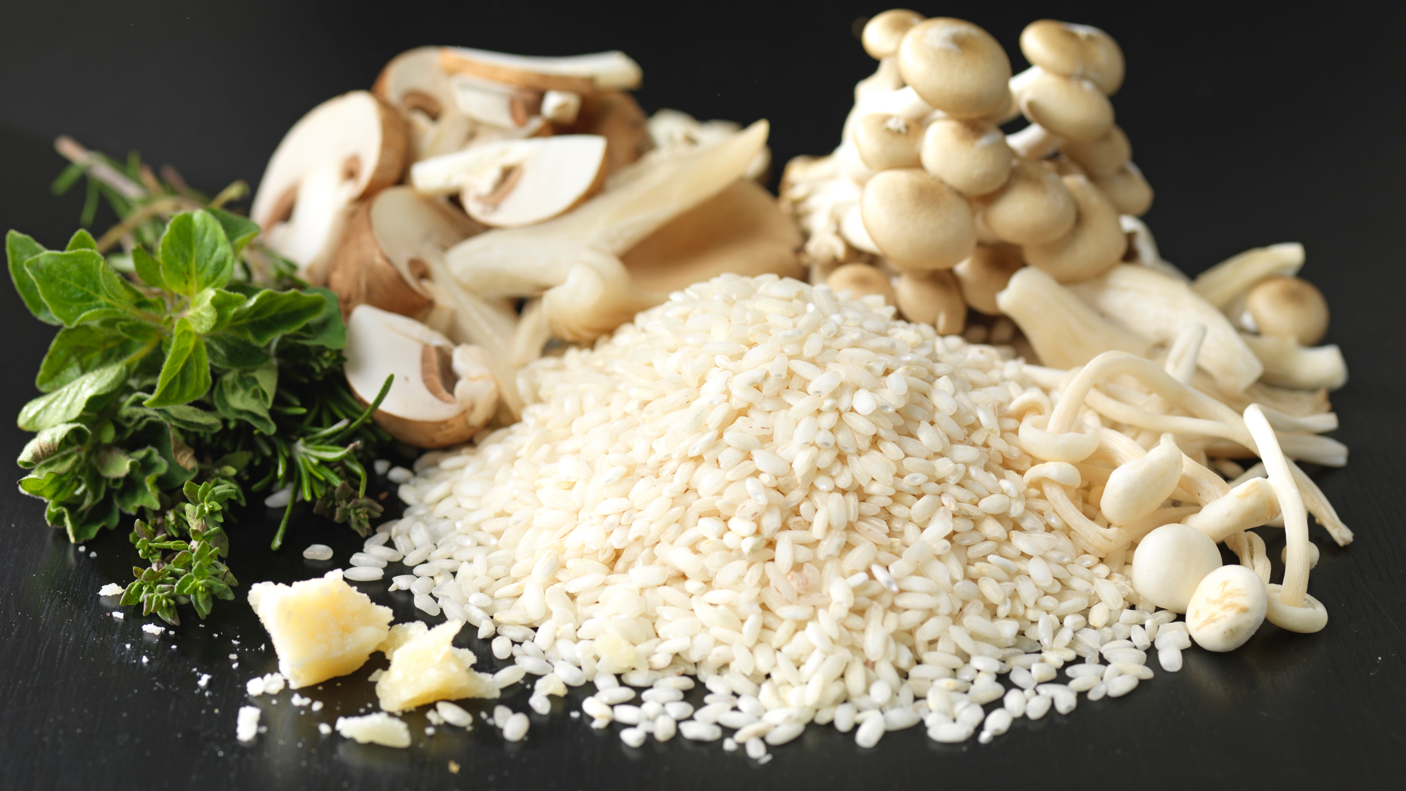 Raw ingredients for risotto - rice & mushrooms