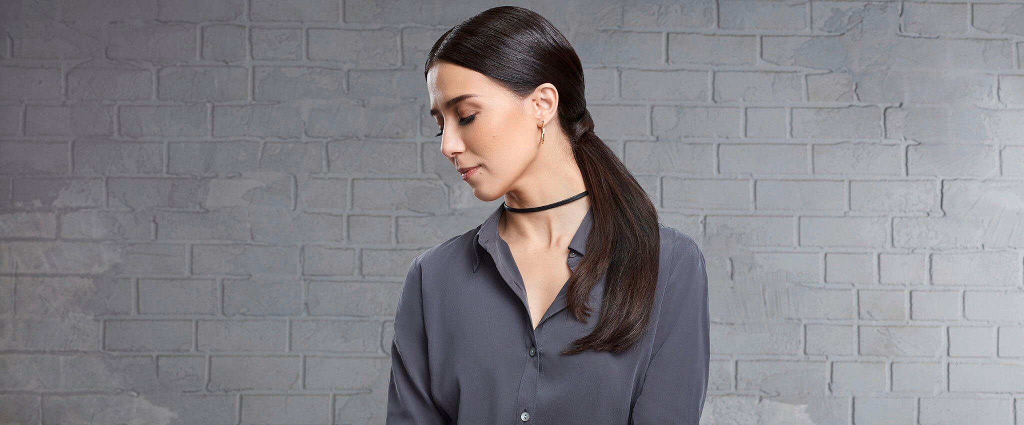 Foto da Tainá Müller com seu penteado ponytail torcido