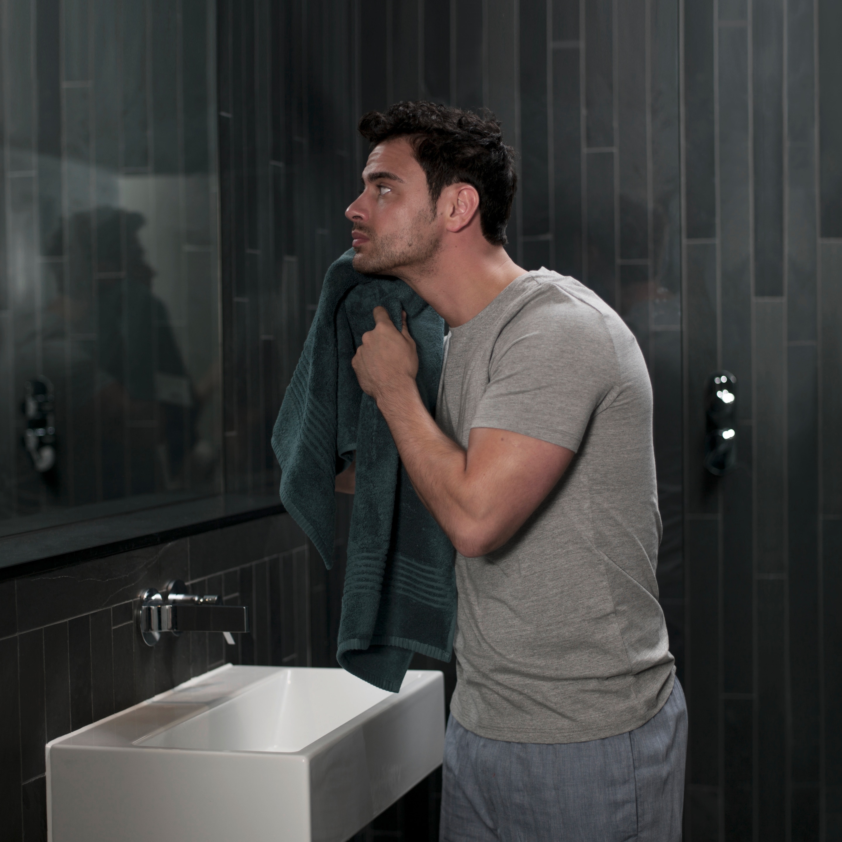 Dove Men+Care Man using a towel