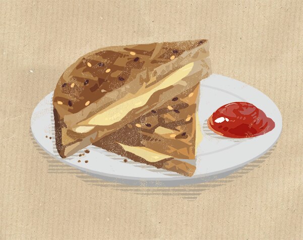 two cheese toasties with ketchup