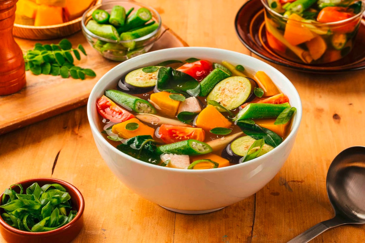 A big bowl of bulanglang with okra, eggplant, squash, tomatoes, and malunggay leaves