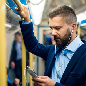 Man commuting on a train