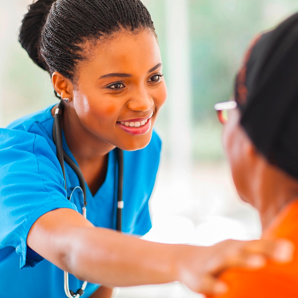 nurse comforting a patient