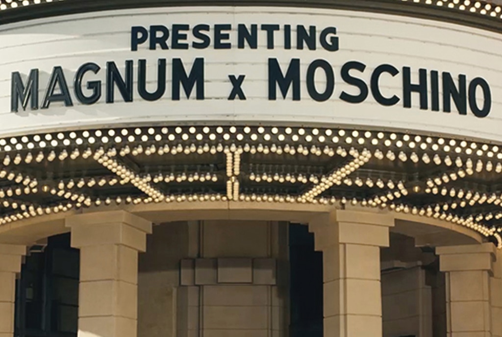 Carla Delevgine outside a Movie theatre showing Magnum x Moschino