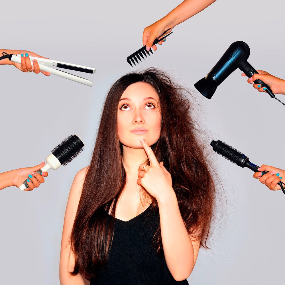 Lady with styling tools around her hair