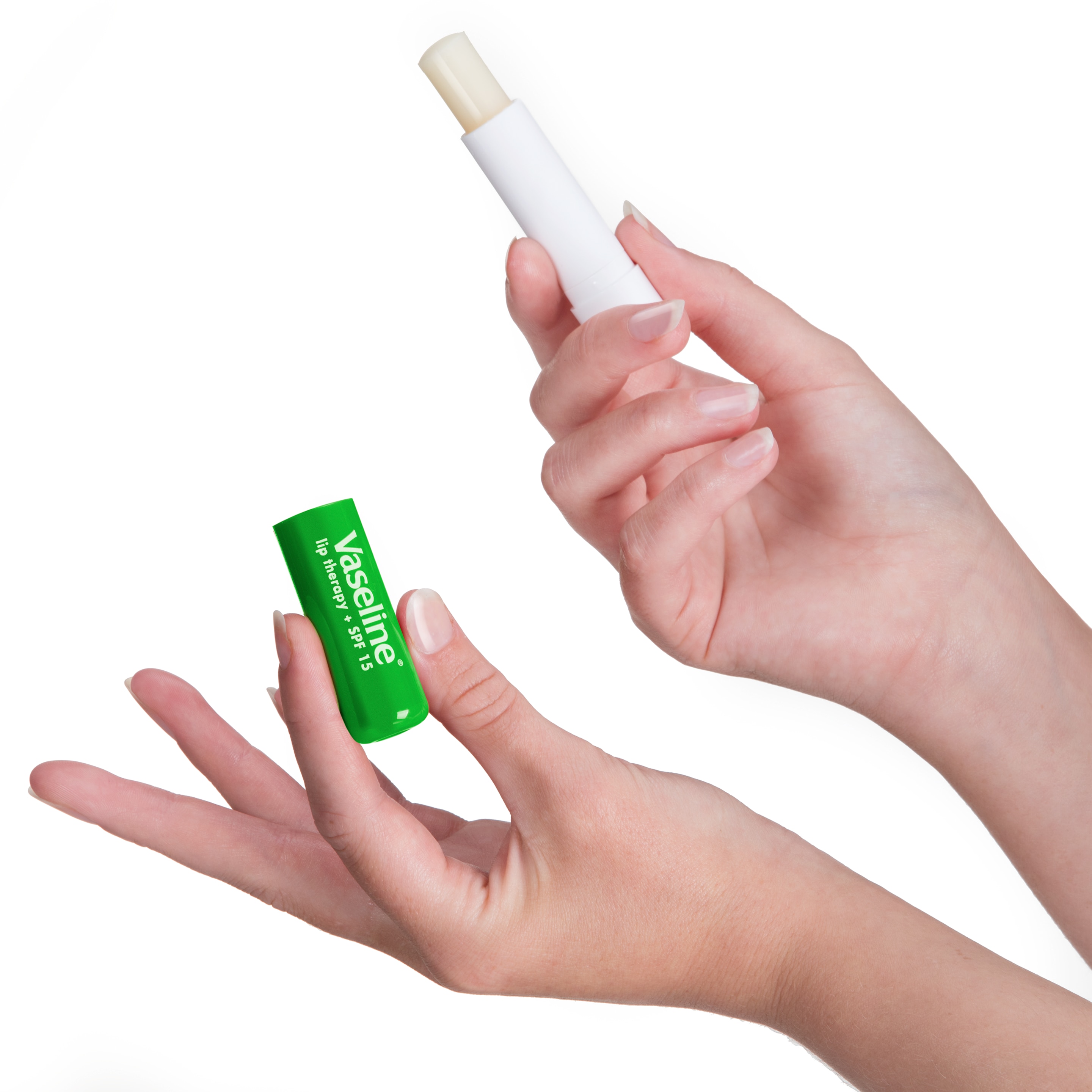 hands holding Vaseline® Lip Therapy® Aloe Vera Stick