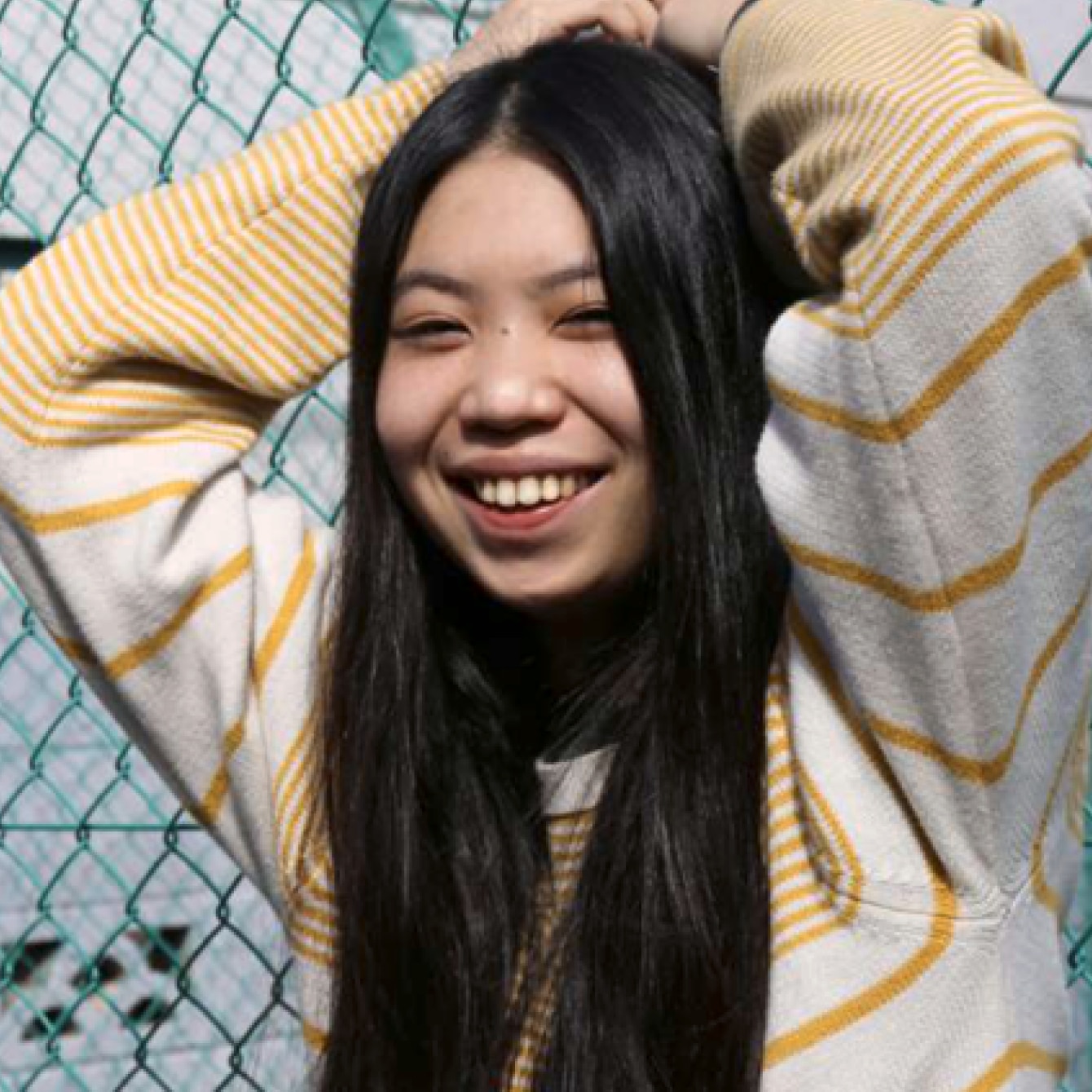 Women with hands in hair